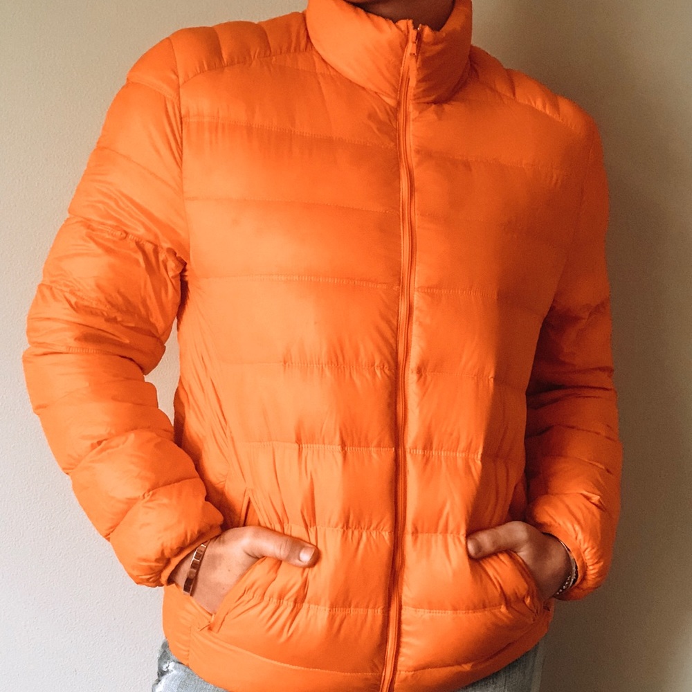 Orange, down, zip up winter jacket
